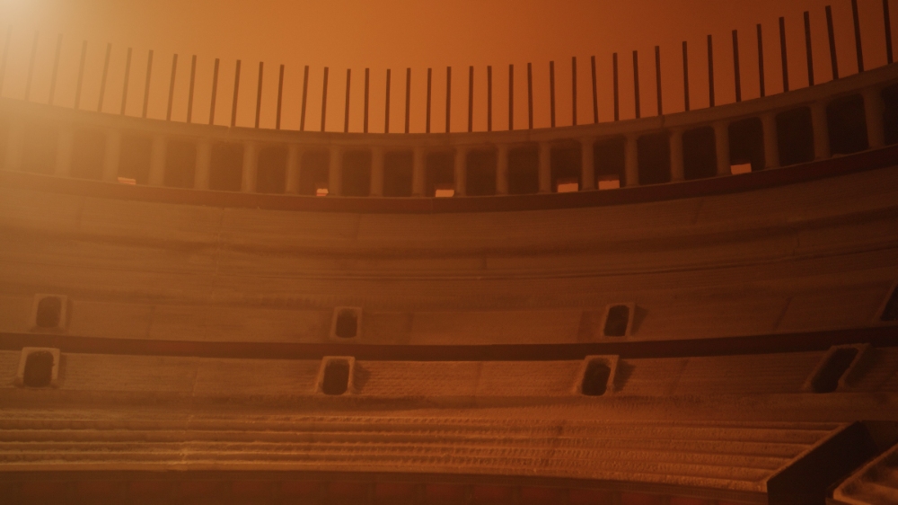 Roman Arena Scene Dramatic wide shot of Roman colosseum arena in warm haze