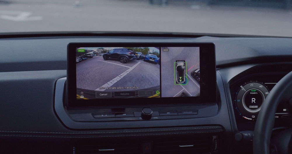 Car Camera Display Car infotainment screen showing rear-view and surround cameras