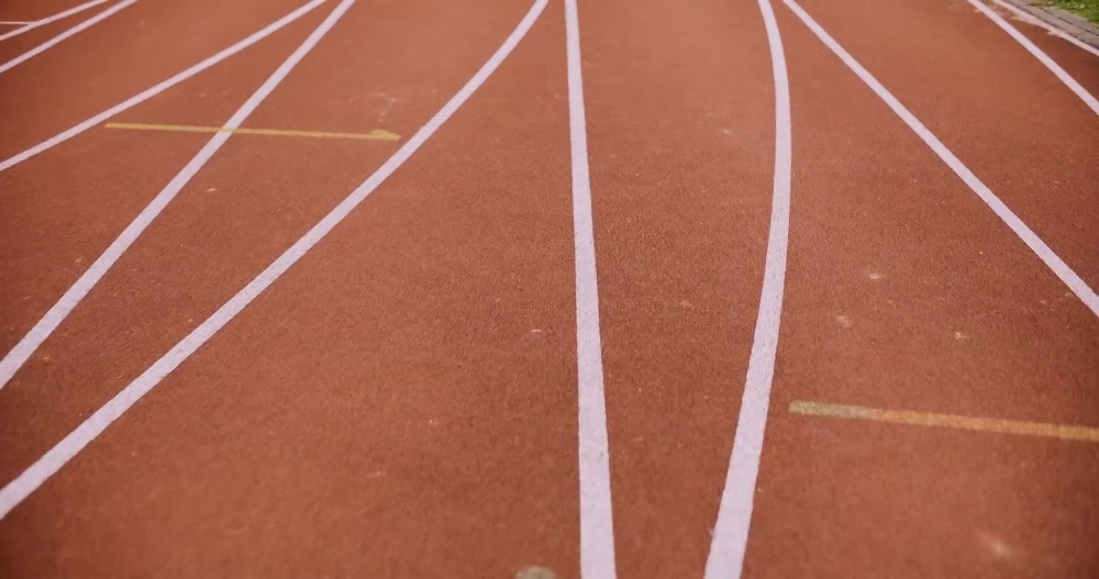 Athletics Track Lanes Close-up of red athletics track with white lane markings