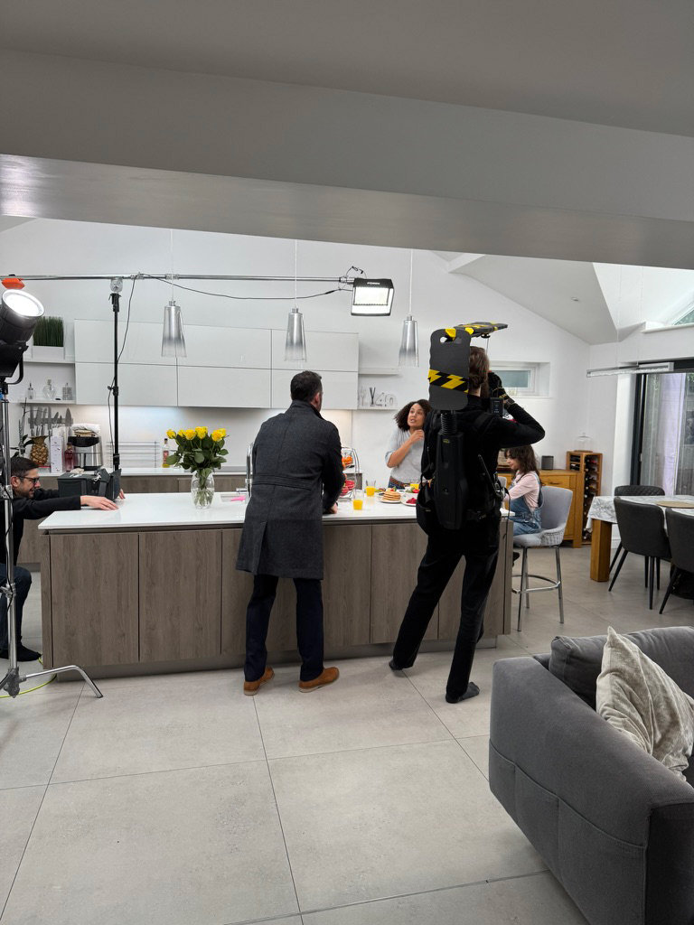 Kitchen Studio Recording Film crew recording a studio shoot inside a modern kitchen