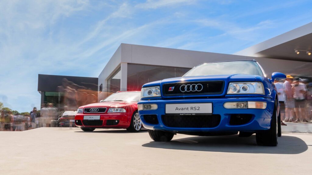 Audi RS2 Display Blue and red Audi RS2 cars parked at car show